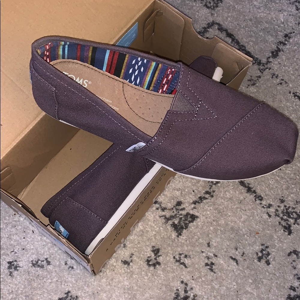 Tom’s. Brand new, never worn